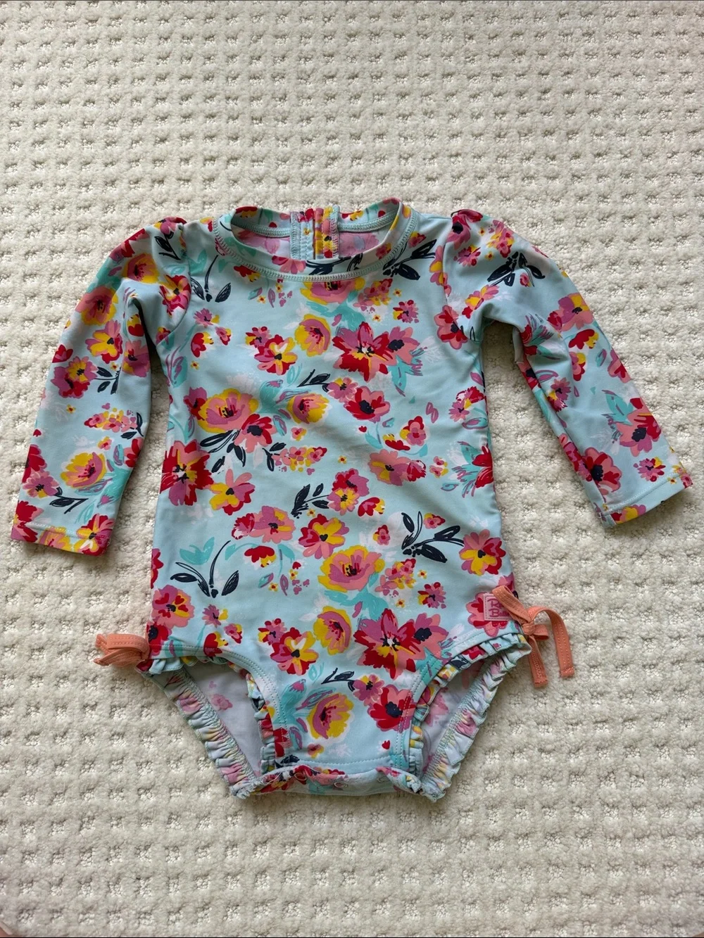 Ruffle Butts Aqua Floral Long-Sleeve Swim One-Piece with Pink and Yellow Flowers
